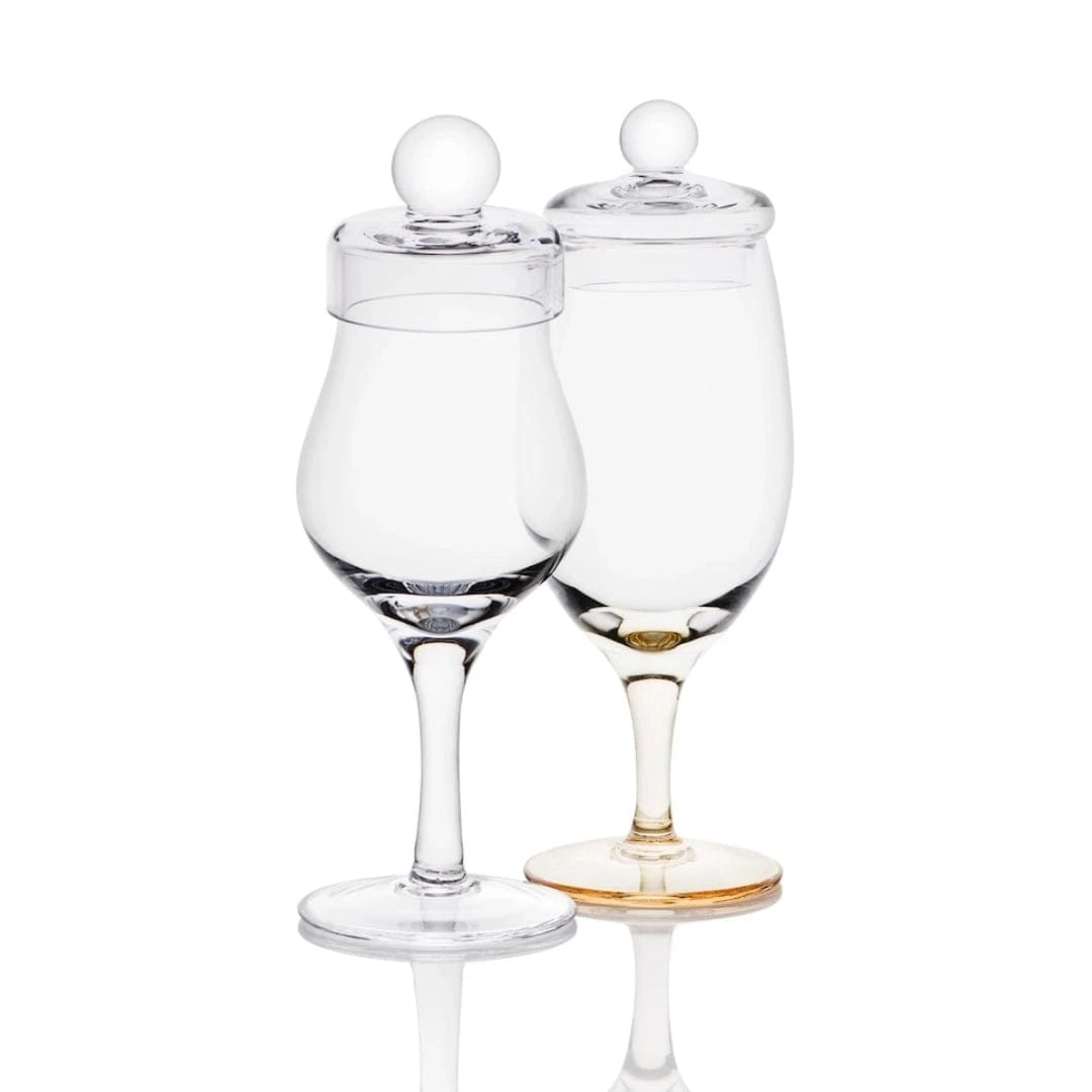 In this photo Amber Tasting Box – 2 Hand-Blown Whisky Glasses with Lids – Amber Glass Mood4whisky